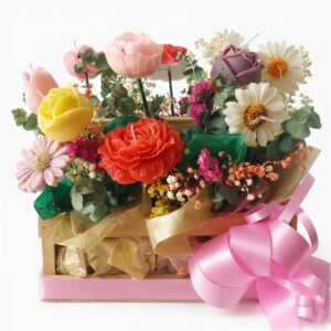 Cesta flores primavera artesanal madera 12 flores aromatizadas follaje natural Colombia
